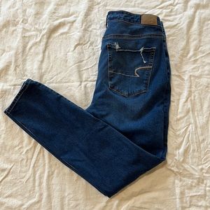 AMERICAN EAGLE “The Dream Jean” Skinny Jean with Holes Super Hi-Rise Jegging
